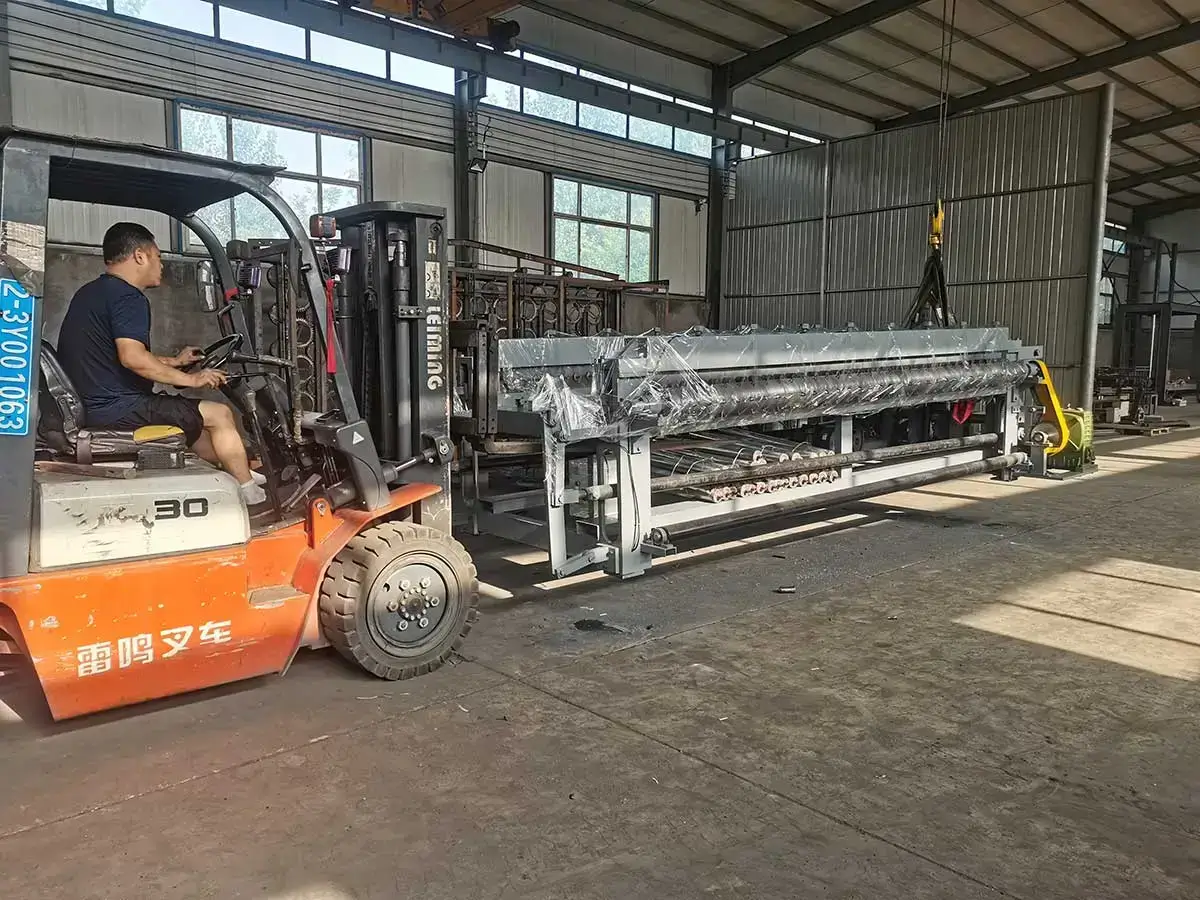 Forklift operator transporting gabion box making machine towards loading bay