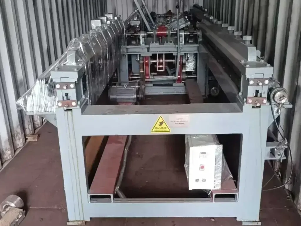 A small hexagonal wire mesh machine securely loaded inside a 20ft shipping container, ready for sea freight or land transport