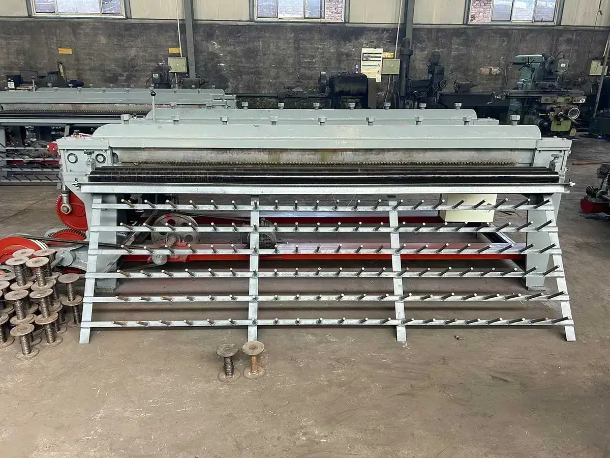 Small hexagonal wire mesh machine rear view, wire feeding peg rack