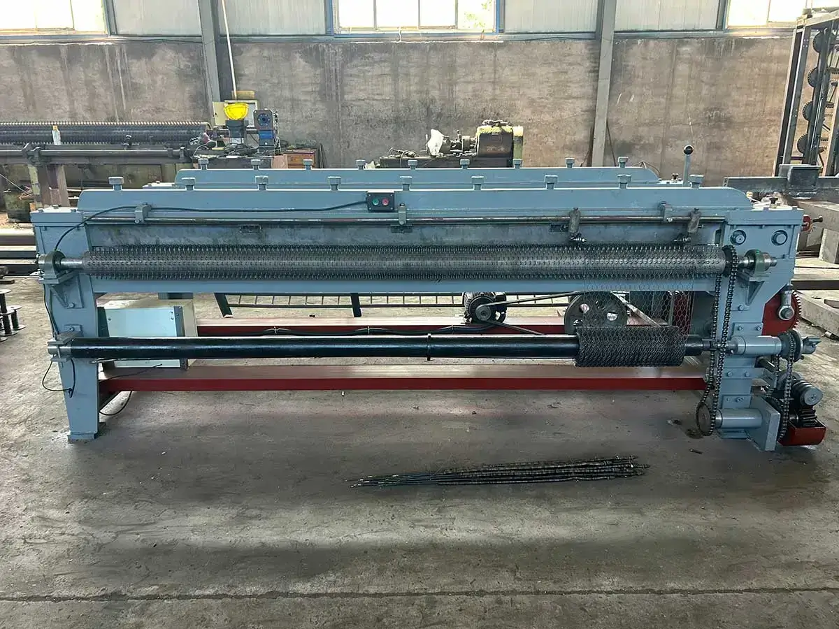 Small hexagonal wire mesh machine, front view with finished mesh roll